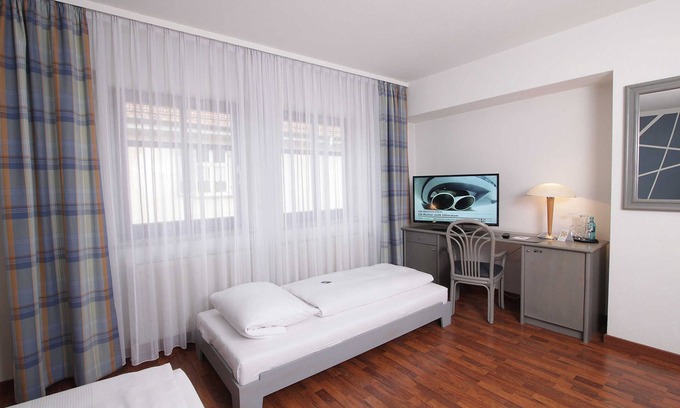 Erlangen Cottage | Einzelzimmer Komfort - Art Hotel Erlangen