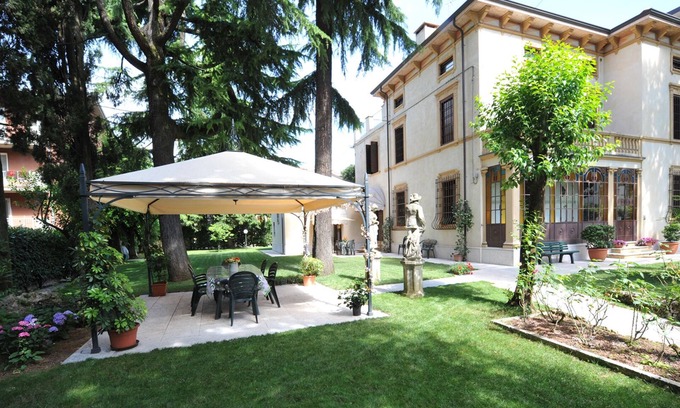 Borgo Trento Apartment | Elegant apartment in Art Nouveau villa near the center with private parking