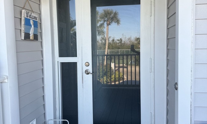 Palm Island Villa | Enjoy an Unobstructed view of the Gulf from this Cheery Villa! B2913A