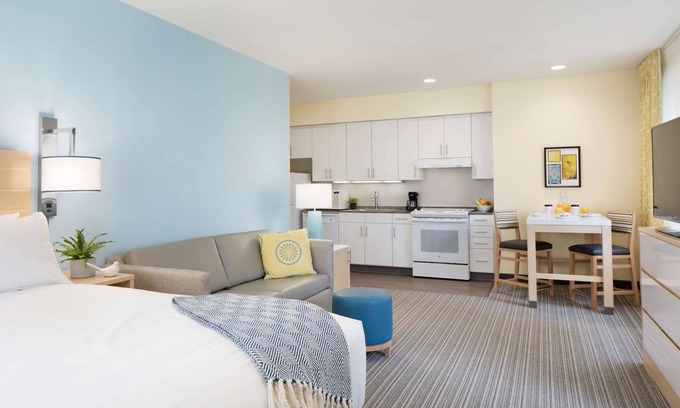 Central Business District Apartment | Enjoy the Perks! Free Breakfast, Kitchen, Onsite Parking, Pets Allowed!