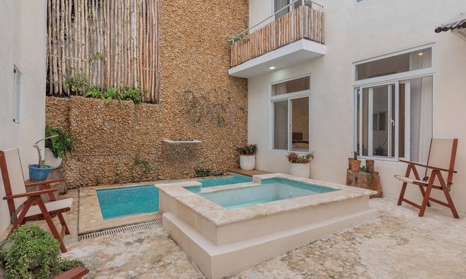 Zona Colonial Apartment | Enriquillo 2-bdrm apt with ensuite baths, full kitchen, and cozy living room.