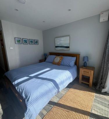 Rhoscolyn Apartment | Entire guest suite in Four Mile Bridge, Rhoscolyn