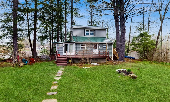 Augusta Cabin | Entire lakefront duplex on Togus Pond with decks, canoe, firepit & great view