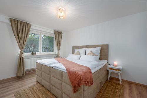 Schwerte Apartment | Entspannung im Boho-Flair: Sauna & Whirlpool