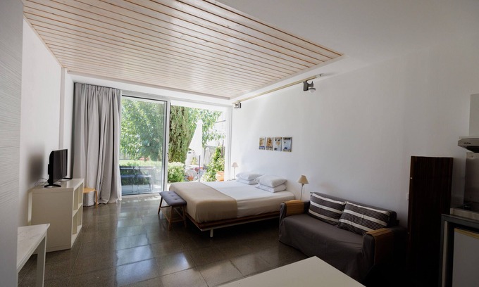 Pentakomo Apartment | Eupnea | Studio Apartment, Art by PraXis Apartments