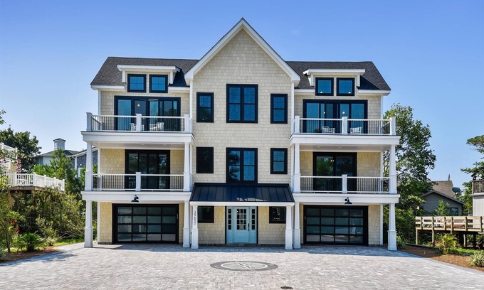 Bethany Beach House | Exceptional beach home located just steps from the beach front in beautiful family friendly Ocean Village, one of North Bethany’s most sought after private gated communities!