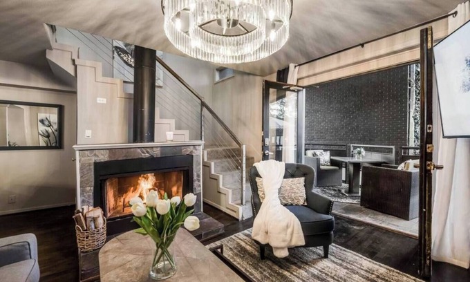 Lower Greenville Condo | Expansive 2-bed loft with fireplace, full kitchen, smart TVs, and access to an award-winning courtyard & resort pool.