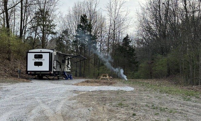 Carterville RV Rental | Experience Glamping in style. private Hot tub spa! Private lake -Pet Friendly