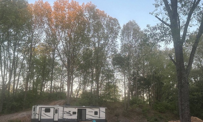 Carterville RV Rental | Experience Glamping in style. Private Lake - Pet Friendly!