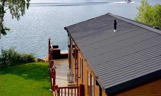 Dogdyke Cabin | Fable Lodge - Luxury lakeside lodge with sunken hot tub at Tattershall Lakes