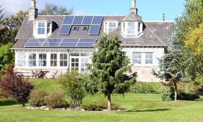 Braemar House | Fabulous sunny house in large private gardens. Sun porch & patio. Mountain views