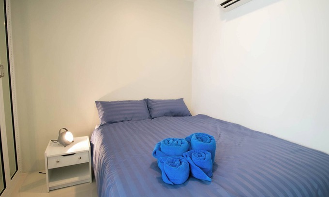 Kram Condo | Family for 4 people, 2 pools, AC, Kitchen, Fitness and near the beach