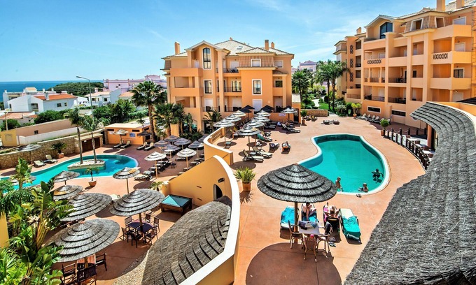 Luz Apartment | Fantastic 1 bed Apt with heated pool/sauna/hot-tub/gym