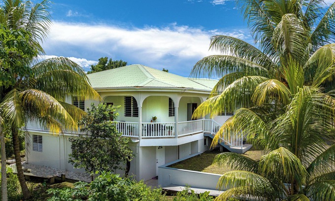 La Plaine Apartment | Ferapalms Tropical Escape with Scenic Ocean and Mountain Views