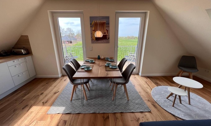 Neßmersiel Apartment | Ferienwohnung Hafenblick