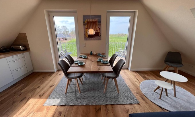 Neßmersiel Apartment | Ferienwohnung Hafenblick