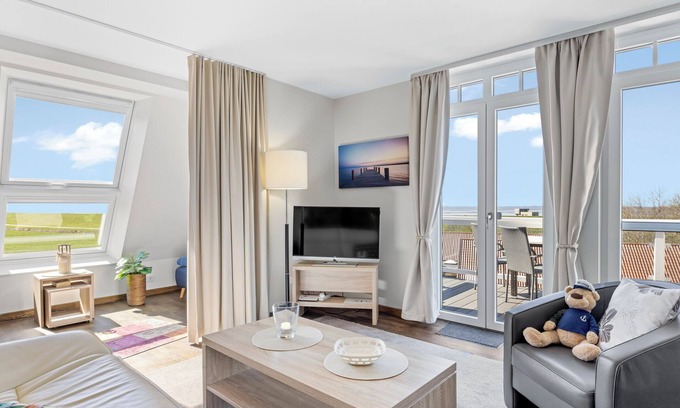 Wremen Apartment | First-class apartment with great sea views, sauna and two balconies!