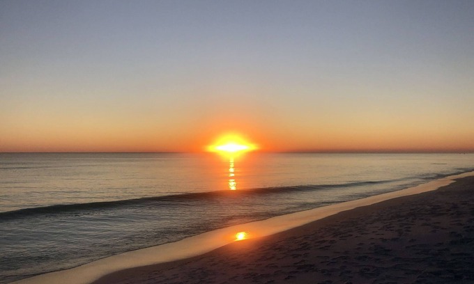 Gulf Place Condo | First floor condo overlooking the heated pool. Steps from the private beach!