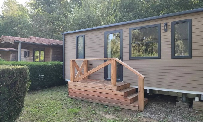 Leval House | Flower Camping du Lac de la Seigneurie * - Cottage Ohara Premium Garden Side 30m2-2 bedrooms 1 bed160-Semi-covered terrace- Forest view- LV 4 people