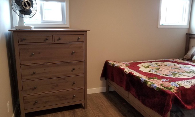Northwest Calgary House | For female only Bedroom with queen bed