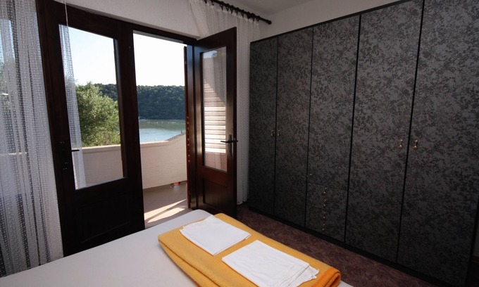 Kampor Apartment | Four-bedroom apartment with terrace and sea view Kampor, Rab (A-5051-b)