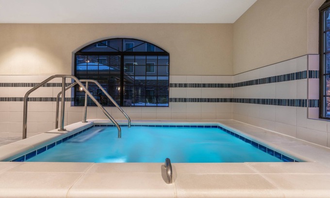 Midtown Anchorage Condo | Free Daily Breakfast, Business Center + Heated Indoor Pool Access