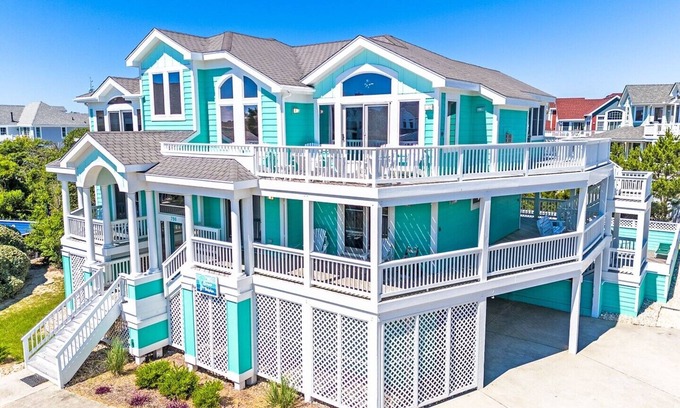 Buck Island House | Free pool heat, hot tub, elevator, chefs kitchen, gated community with tennis, lap pools, ocean f.