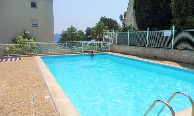 Tamaris Apartment | Garden with barbecue, swimming pool