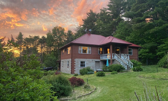 Town of Lumberland Ski Chalet | Giant chalet with private lake access. Hot tub. pet friendly. ultimate game room