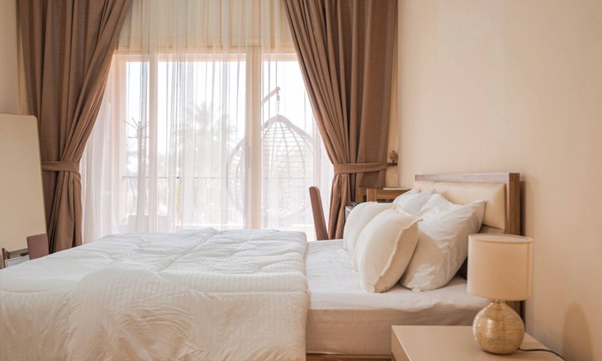 Al Hamra Village Apartment | Golfside Serenity: Stylish 1 BHK by FREE Holiday Homes
