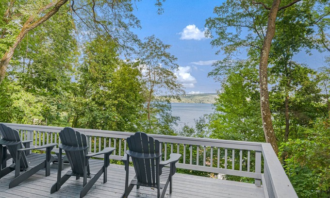 North Lake George House | Gorgeous lakeview retreat with wraparound porch, wood stove, & WiFi - dogs OK