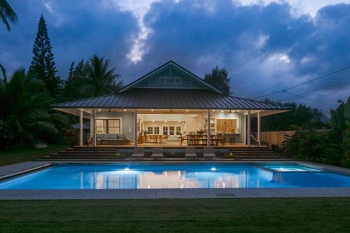 Kalama Tract House | Gorgeous Renovated 1937 Plantation Style Beach House 50 Steps to the Center of the Beach home