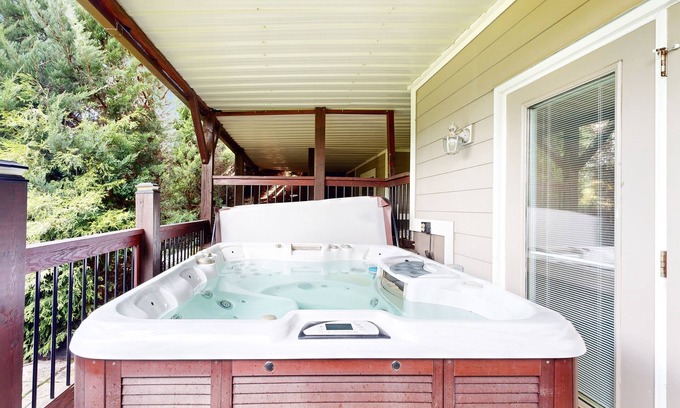 Avery Creek House | Grand mountain-view retreat with hot tub, 2 living areas, foosball, fireplace