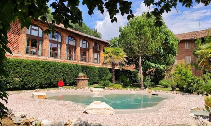 Belveglio Apartment | Grape Court. Cellar Apartment.
