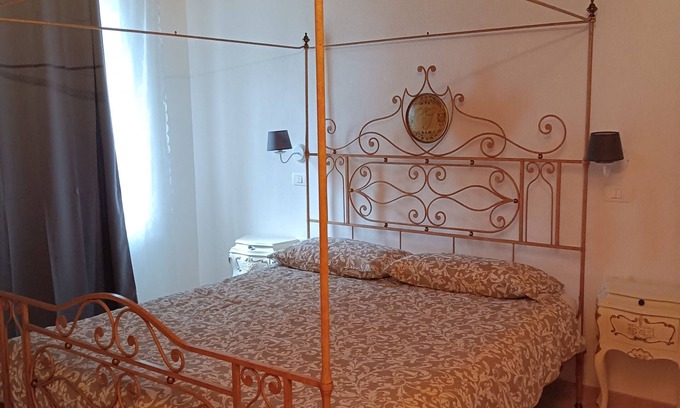 San Michele Apartment | Grazioso Appartamento Casa Rosa Amelia .con Grande Parcheggio Libero a 20 m