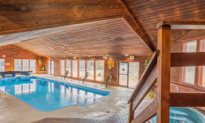 Wildernest Condo | Great views, cozy feel, central to outdoor activities, and relaxing hot tub/pool