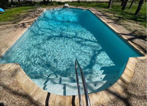 Cross Mountain House | Hill Country House & Pool - Fiesta Texas Sea World