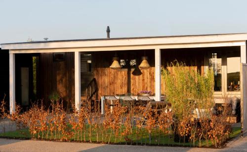 Lith House | Hip huisje aan de Maas