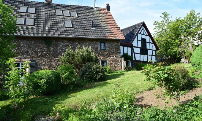 Antweiler Cottage | Historic Eifel country house with beautiful garden, sauna & fireplace
