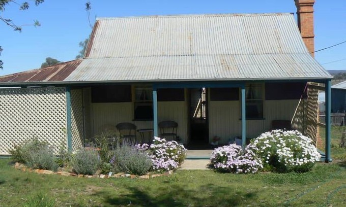 Texas Cottage | Historical workers cottage in the Main Street of Texas