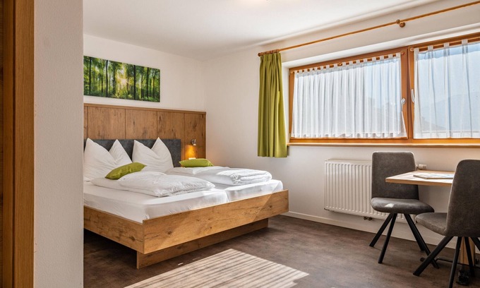 Chifa Apartment | Holiday Apartment 'Alpennest' with Mountain View, Shared Garden and Wi-Fi