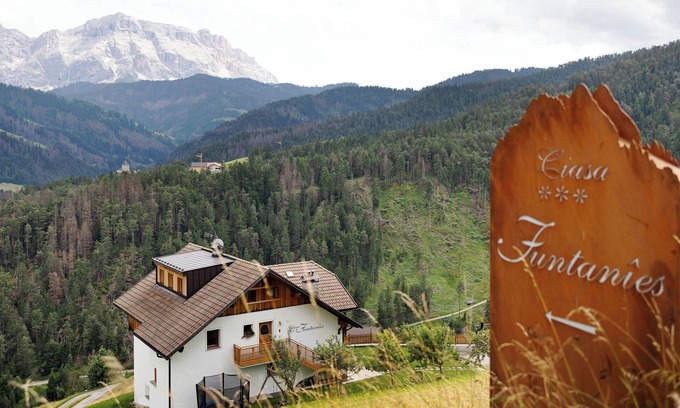 San Martino in Badia Apartment | Holiday Home “Ciasa Funtanies Pütia” with Mountain View, Balconies & Wi-Fi