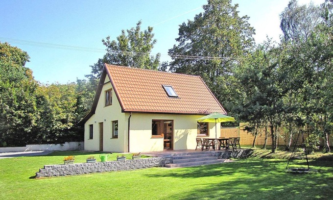 Wilkasy House | Holiday Home by Lake Wilkasy with Rowboat