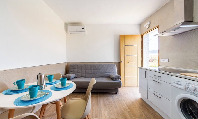 Pujaire House | Holiday Home 'Nido' with Private Terrace and Air Conditioning