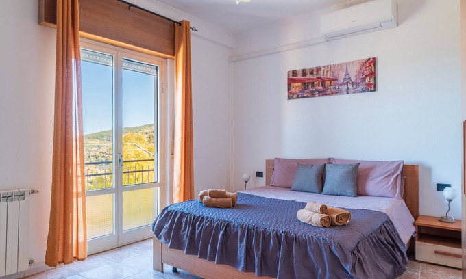 Jerzu House | Holiday Home 'Sa Omu De Sa Palgia' with Sea View, Balcony and Air Conditioning