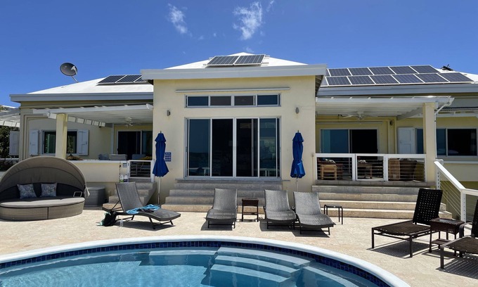 Estate Frenchman Bay Villa | Home with panoramic views with access to private beach!