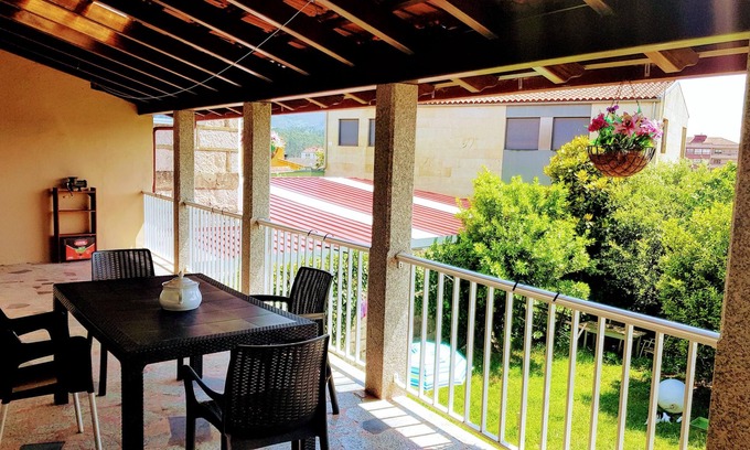 O Porrino House | Homerez - Nice house With mountain view and terrace