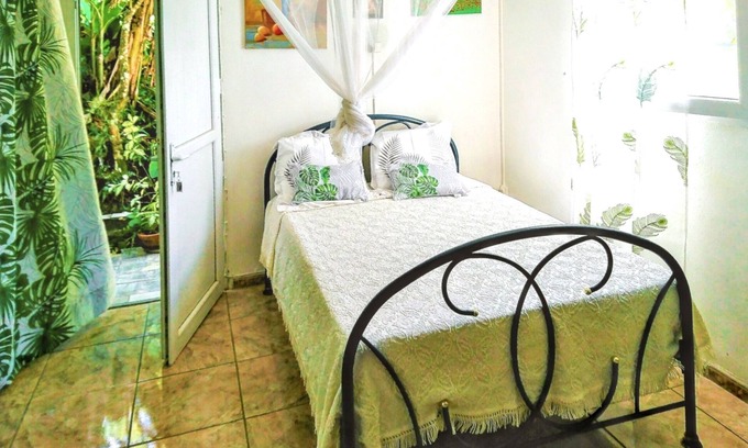 Fontaine de Moutte Apartment | Homerez - Studio Fort-de-France garden view