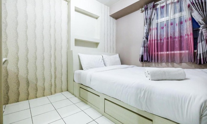 Pancoran Apartment | Homey 2BR Kalibata City Apartment By Travelio