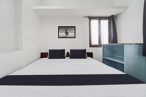 Coimbatore Hotel | Hotel O Kayilai Homestays